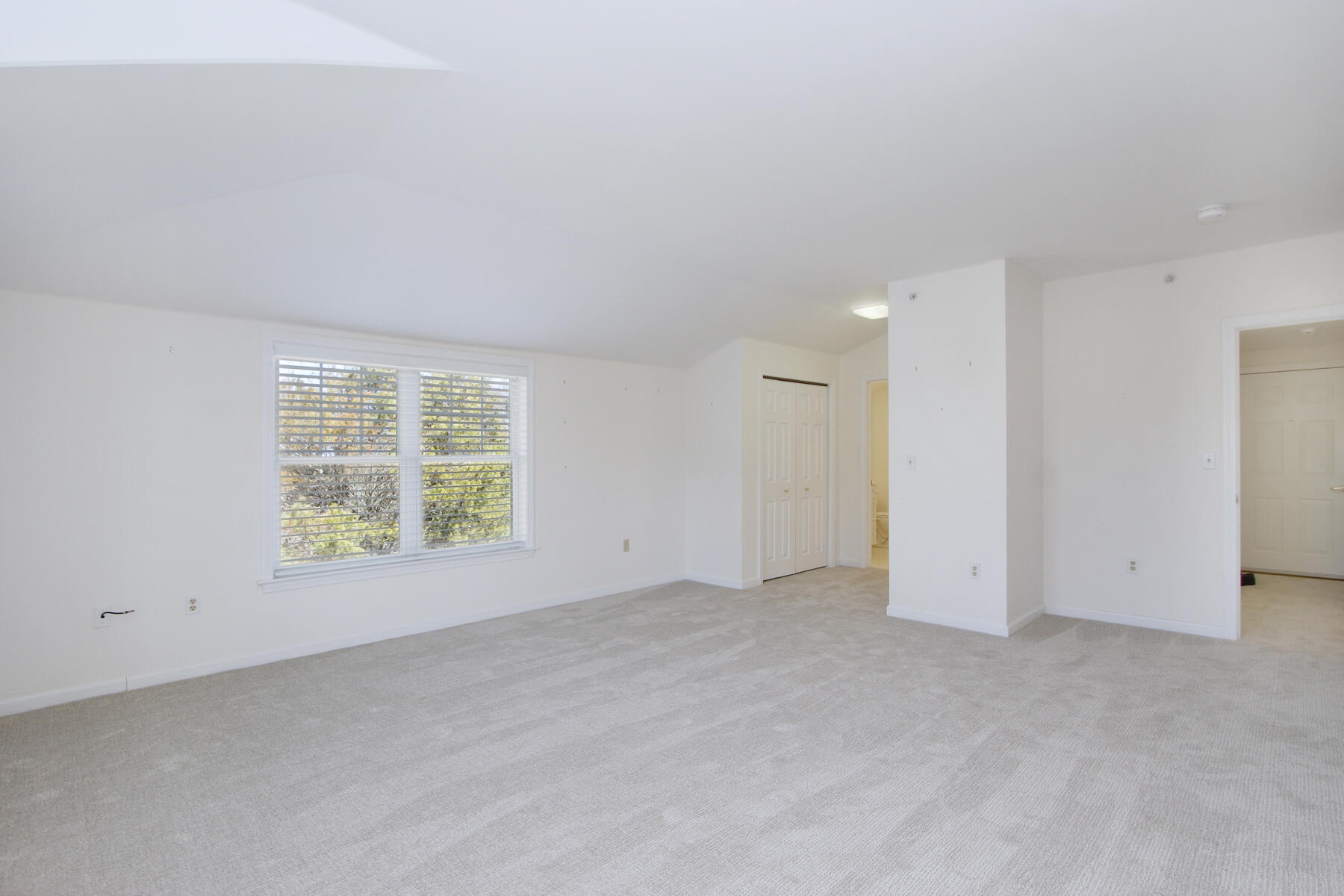 18 West Road, Unit 307 Orleans, MA 02653 - Photo 18 of 35 an empty room with windows