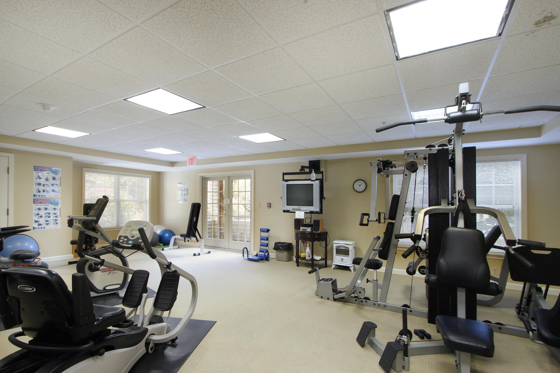 18 West Road, Unit 307 Orleans, MA 02653 - Photo 19 of 31 a view of a room with gym equipment