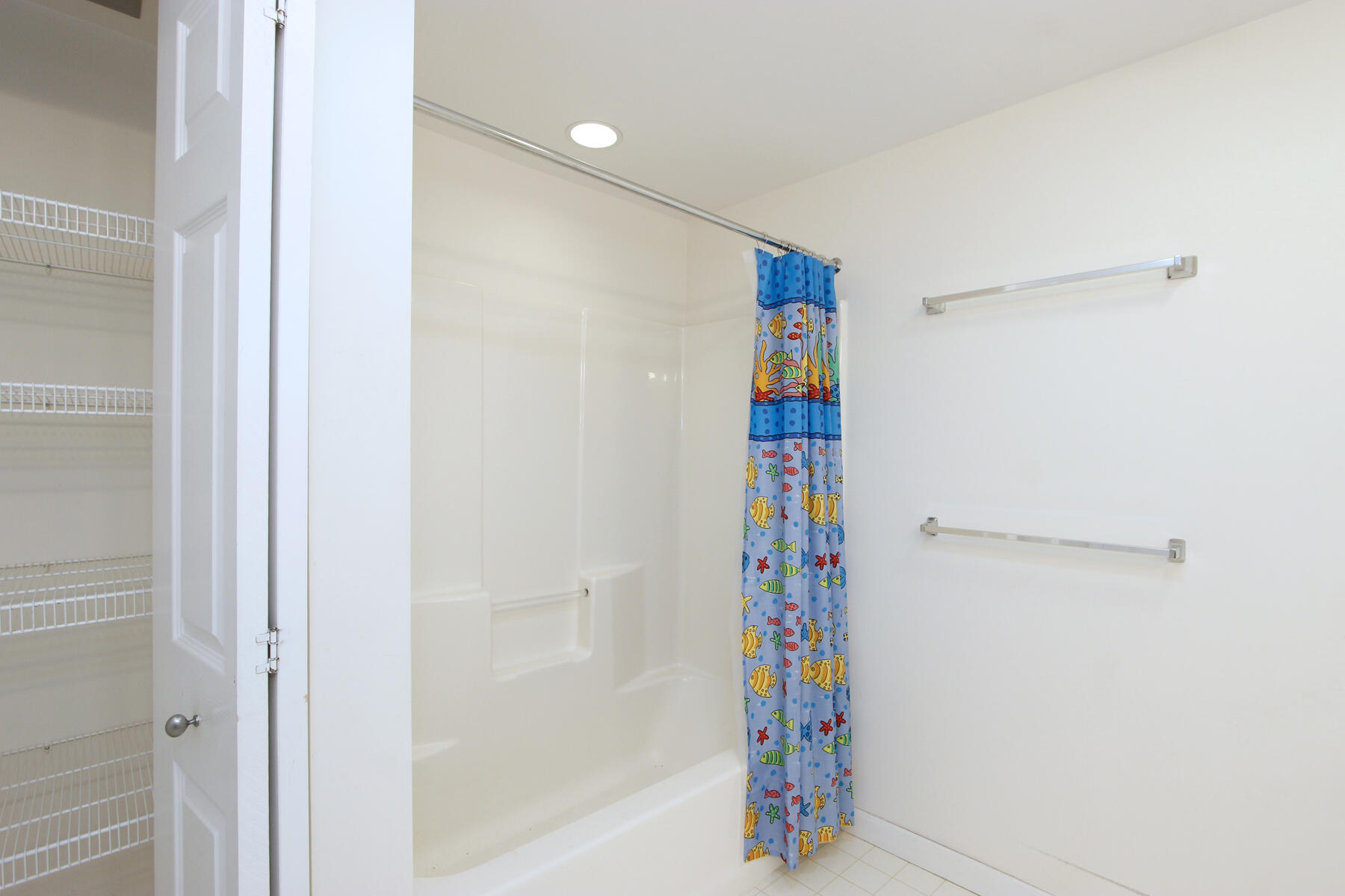 18 West Road, Unit 307 Orleans, MA 02653 - Photo 22 of 35 a view of a hallway with wooden shelves