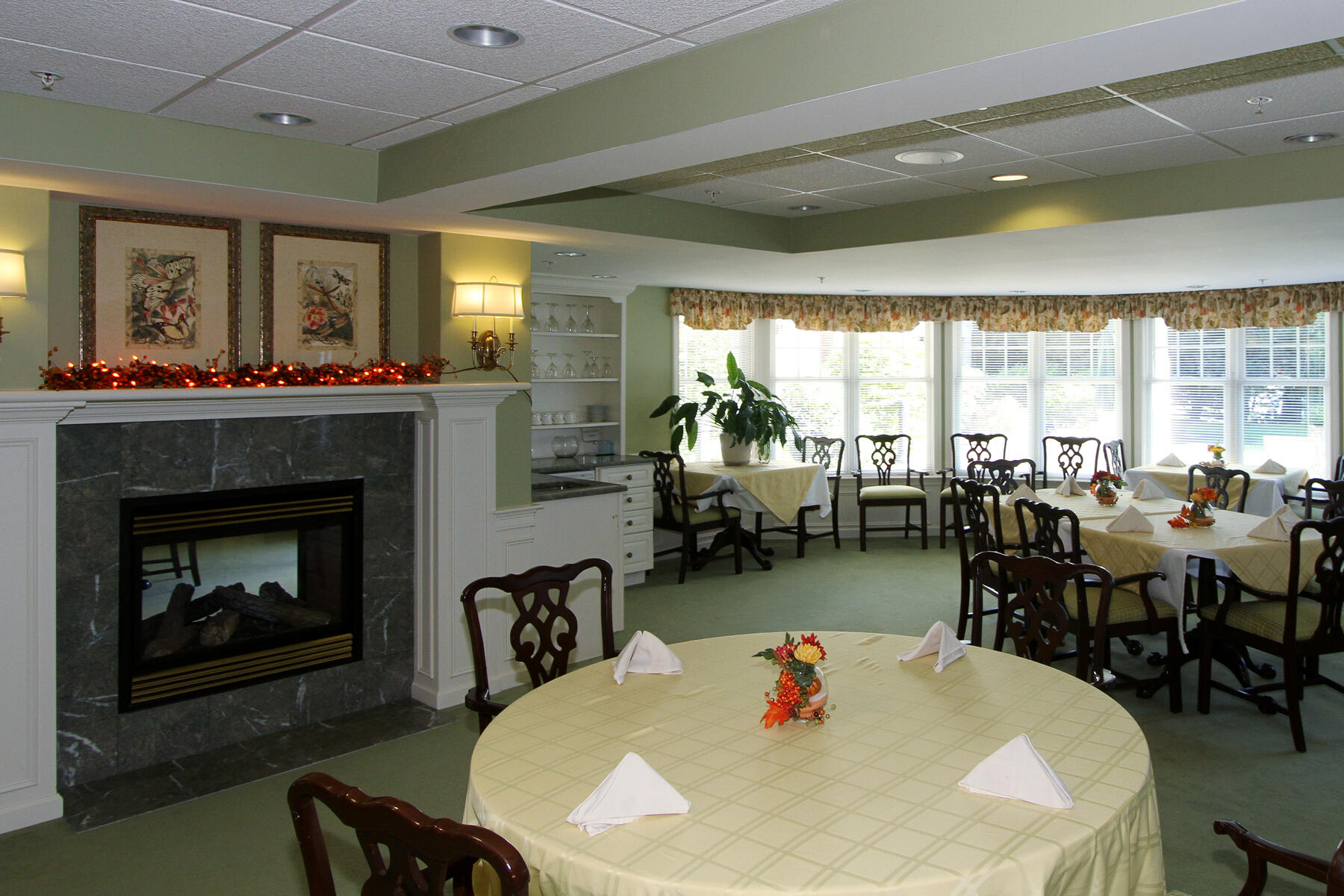 18 West Road, Unit 307 Orleans, MA 02653 - Photo 25 of 31 a view of a dining room with furniture window and wooden floor
