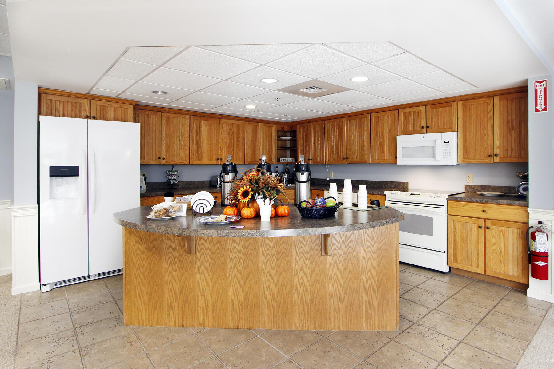 18 West Road, Unit 307 Orleans, MA 02653 - Photo 27 of 35 a living room with stainless steel appliances granite countertop furniture and a kitchen view