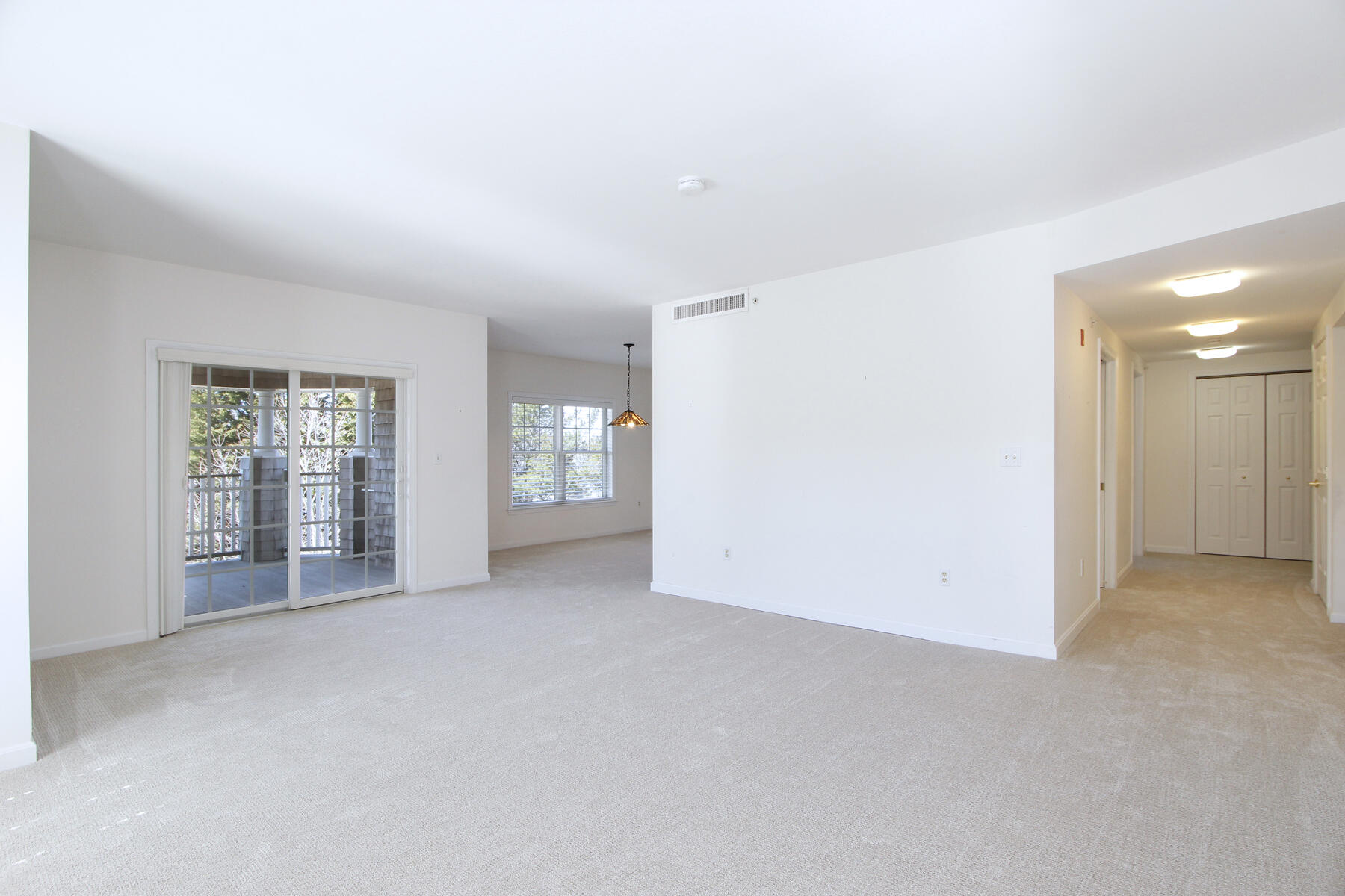 18 West Road, Unit 307 Orleans, MA 02653 - Photo 8 of 35 a view of an empty room with window