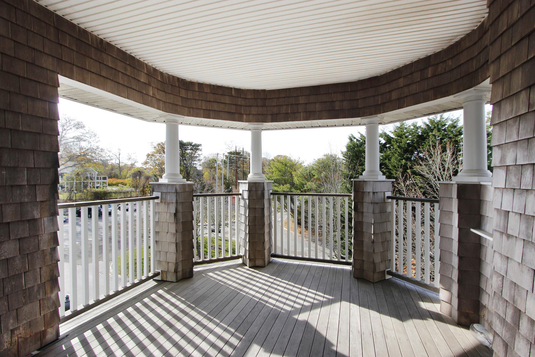 18 West Road, Unit 307 Orleans, MA 02653 - Photo 9 of 35 a view of a porch with wooden floor