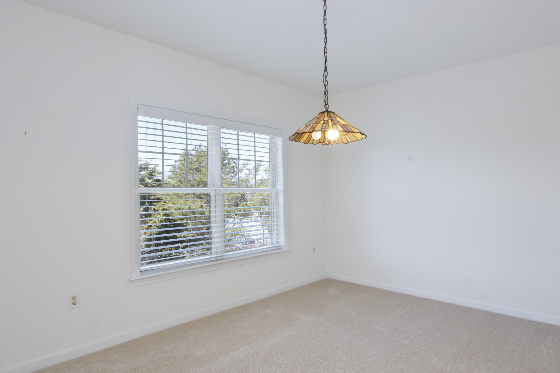 18 West Road, Unit 307 Orleans, MA 02653 - Photo 10 of 35 a view of an empty room with a window