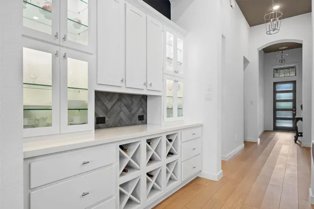 a view of a dining room with furniture and a window
