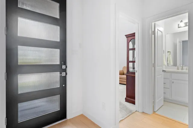 a kitchen with a stove a refrigerator and a sink