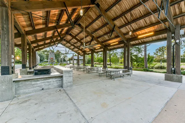 a view of yard with patio