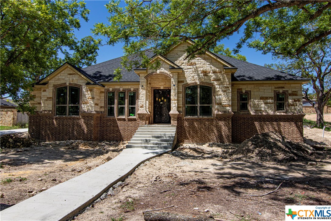 2132 Rivers Edge Drive Belton, TX 76513 - Photo 1 of 1 a view of a house with a tree in the background