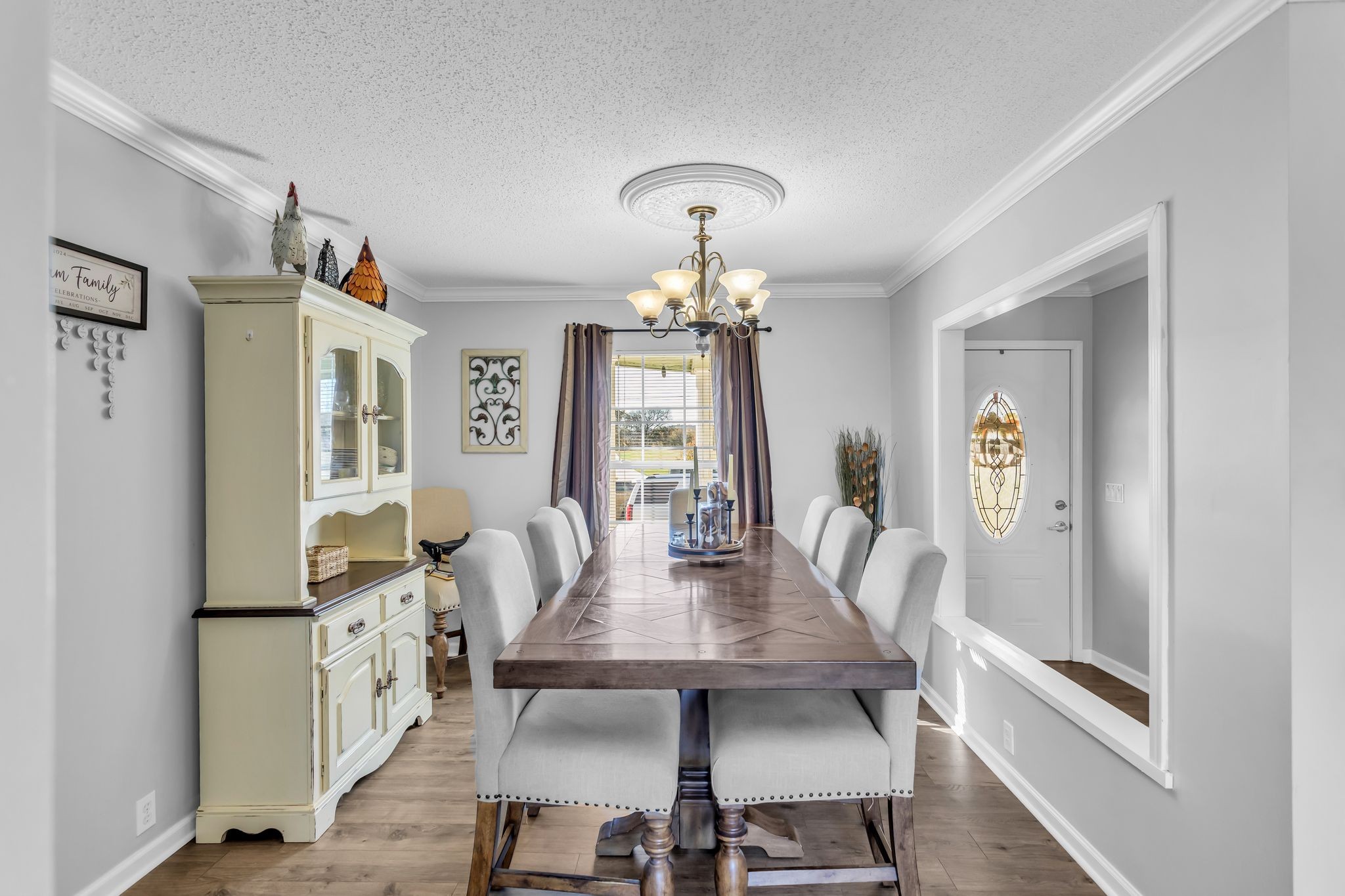 2673 McKnight Road Culleoka, TN 38451 - Photo 11 of 41 a view of a dining room with furniture and chandelier