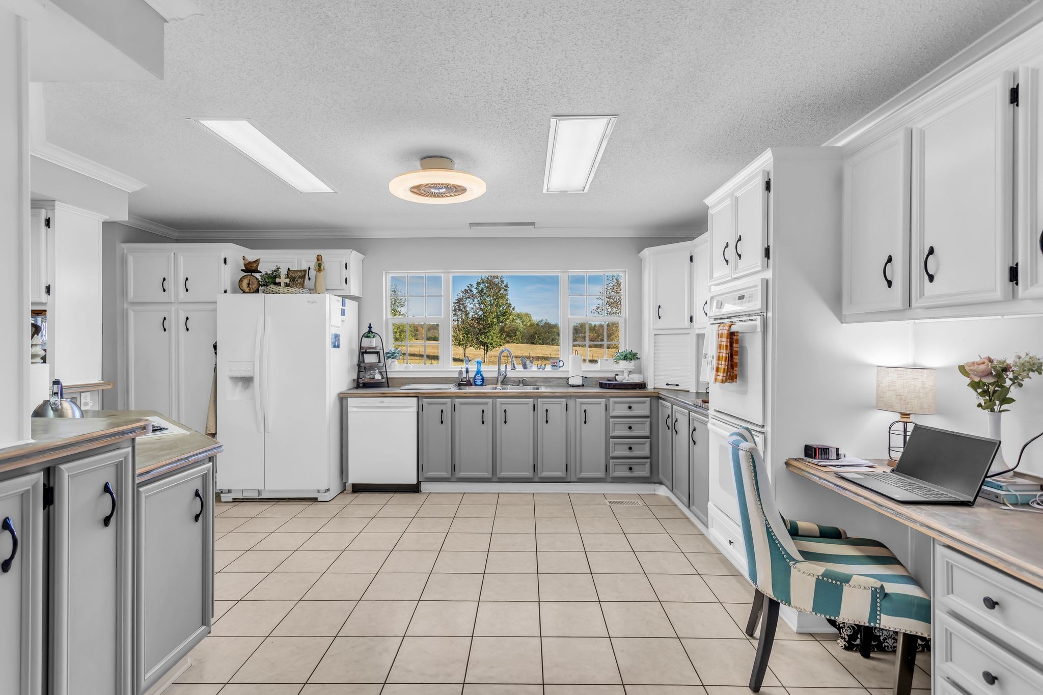 2673 McKnight Road Culleoka, TN 38451 - Photo 13 of 41 a kitchen with a cabinets and appliances
