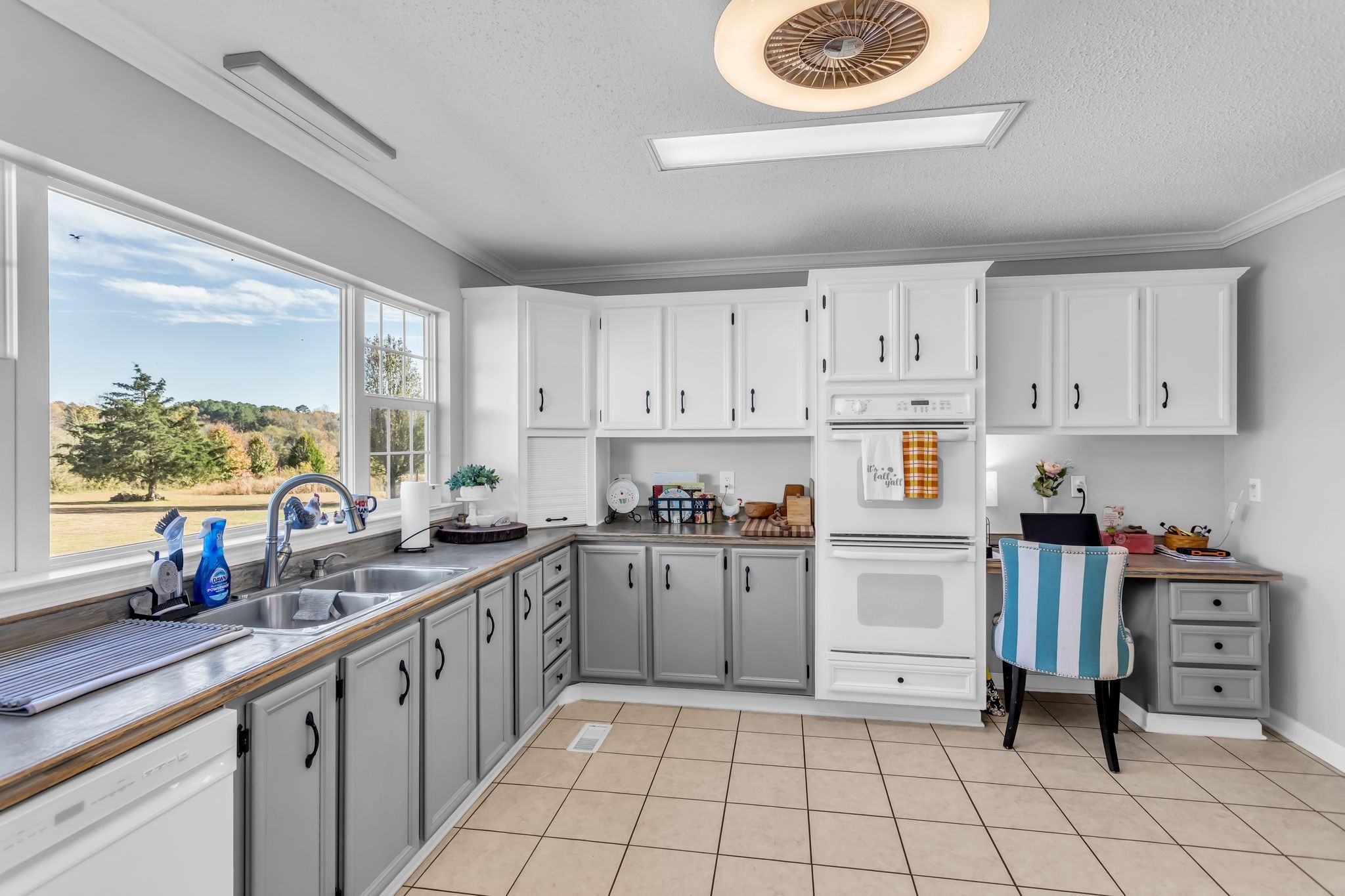 2673 McKnight Road Culleoka, TN 38451 - Photo 16 of 41 a kitchen with cabinets and window