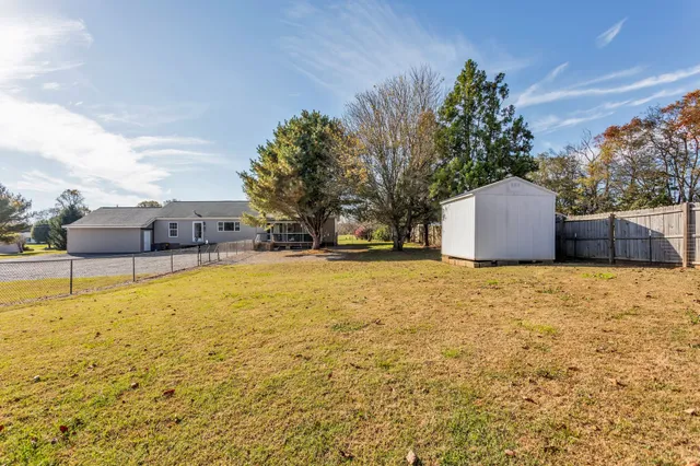 a view of a house with a large window