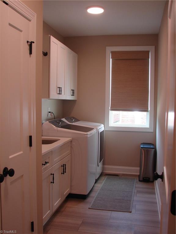 4034 Waterview Road High Point, NC 27265 - Photo 21 of 31 Laundry room with separate sink and linen closet