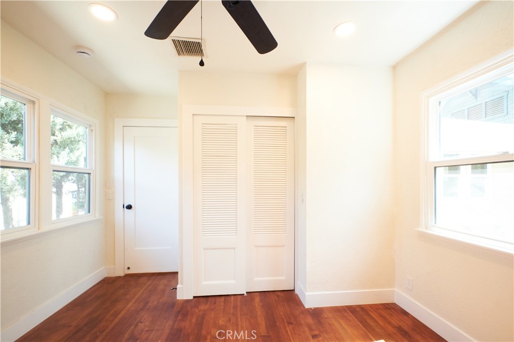 3045 Cedar Street Riverside, CA 92501 - Photo 21 of 25 Bedroom 3 hardwood floor, recessed lighting, backyard view