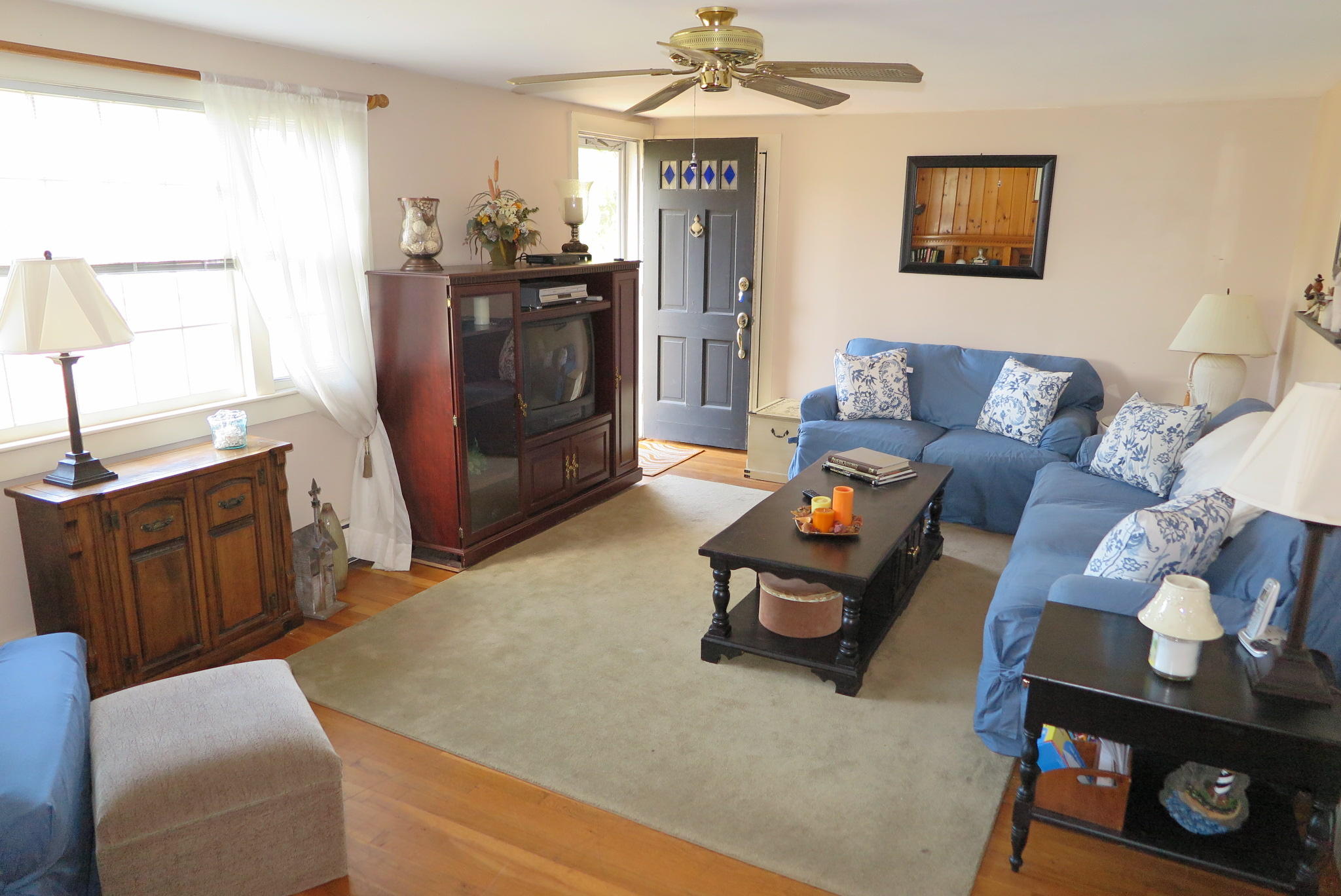 4 Lawrence Road Dennis Port, MA 02639 - Photo 4 of 35 a living room with furniture and a flat screen tv