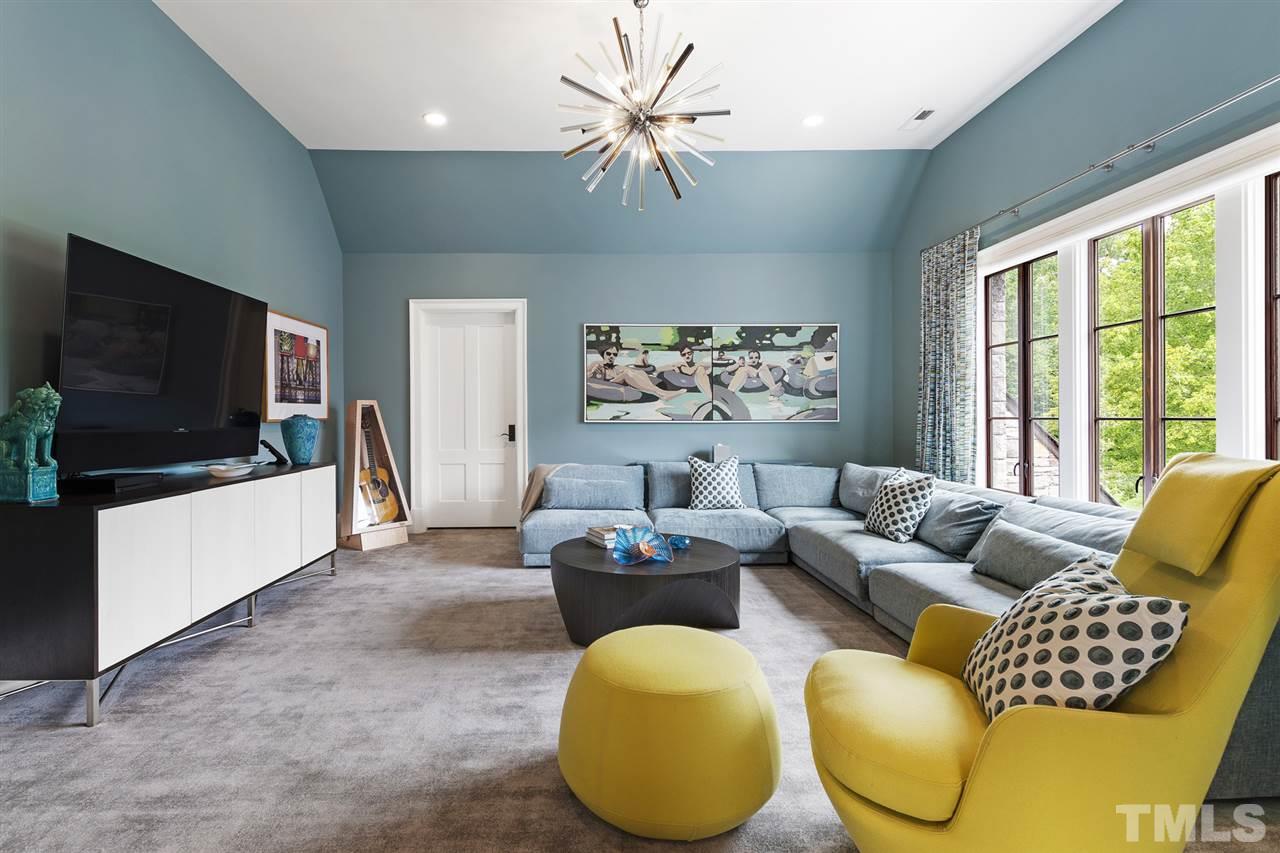 483 Rosemont Drive Durham, NC 27713 - Photo 14 of 88 a living room with furniture and a flat screen tv