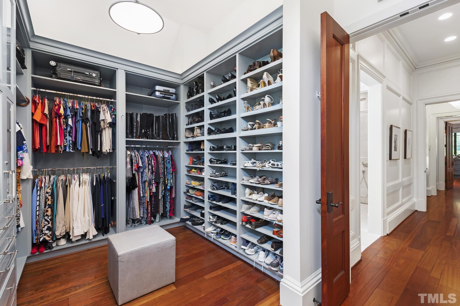 483 Rosemont Drive Durham, NC 27713 - Photo 55 of 88 a view of walk in closet with clothes and shoes