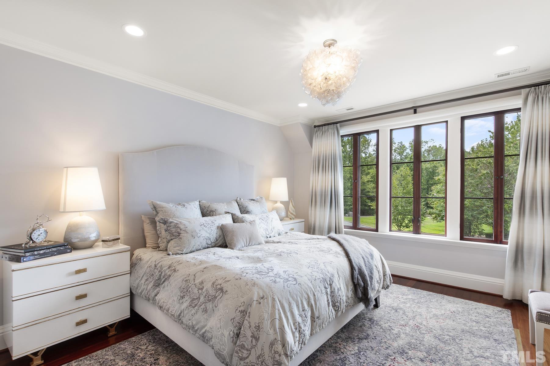 483 Rosemont Drive Durham, NC 27713 - Photo 64 of 88 a bedroom with a large bed and a window