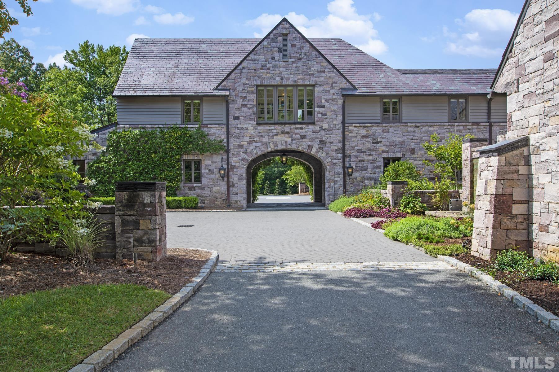 483 Rosemont Drive Durham, NC 27713 - Photo 85 of 88 a view of a house with a yard and plants