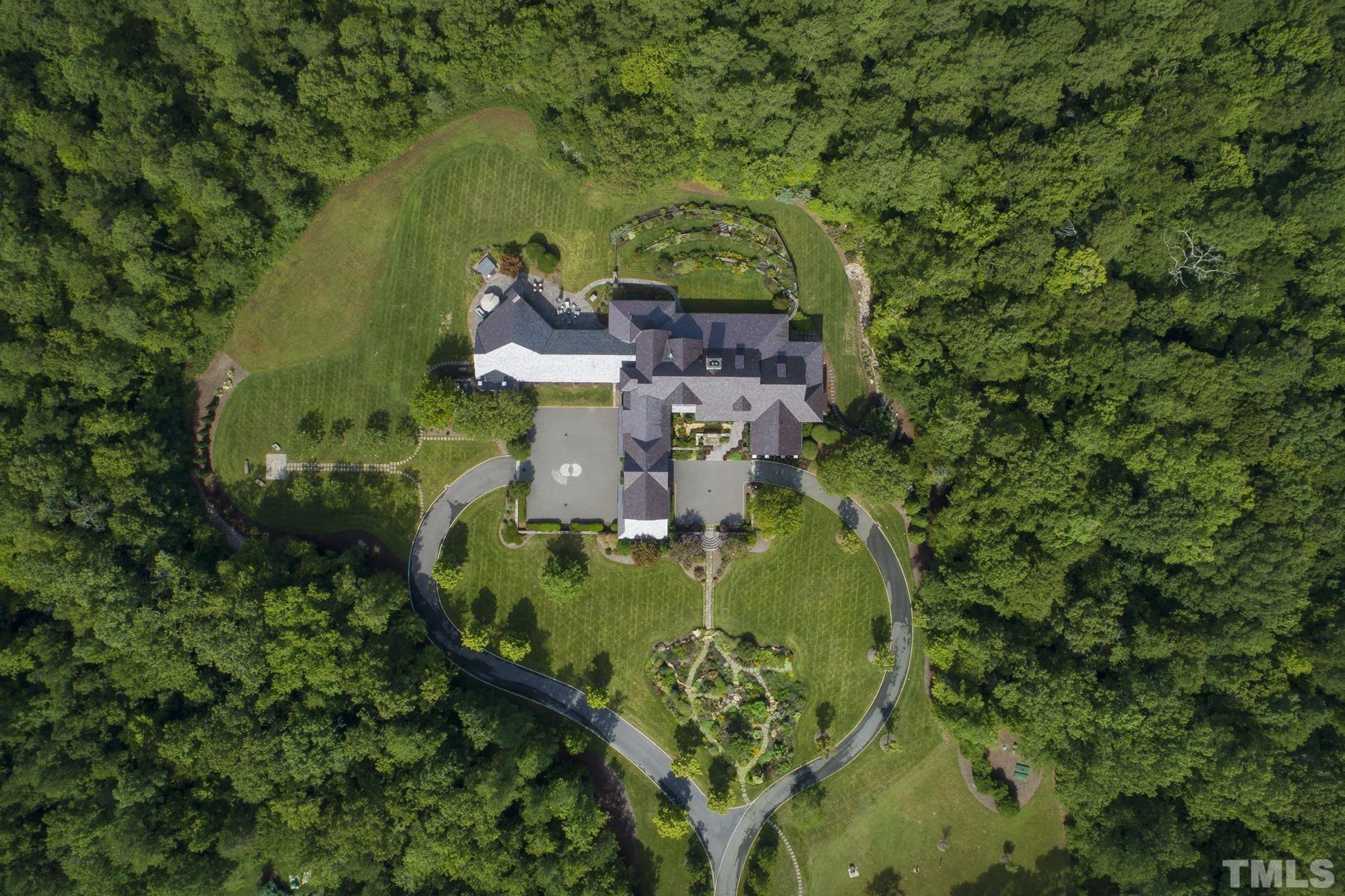 483 Rosemont Drive Durham, NC 27713 - Photo 86 of 88 an aerial view of residential house with outdoor space and trees all around