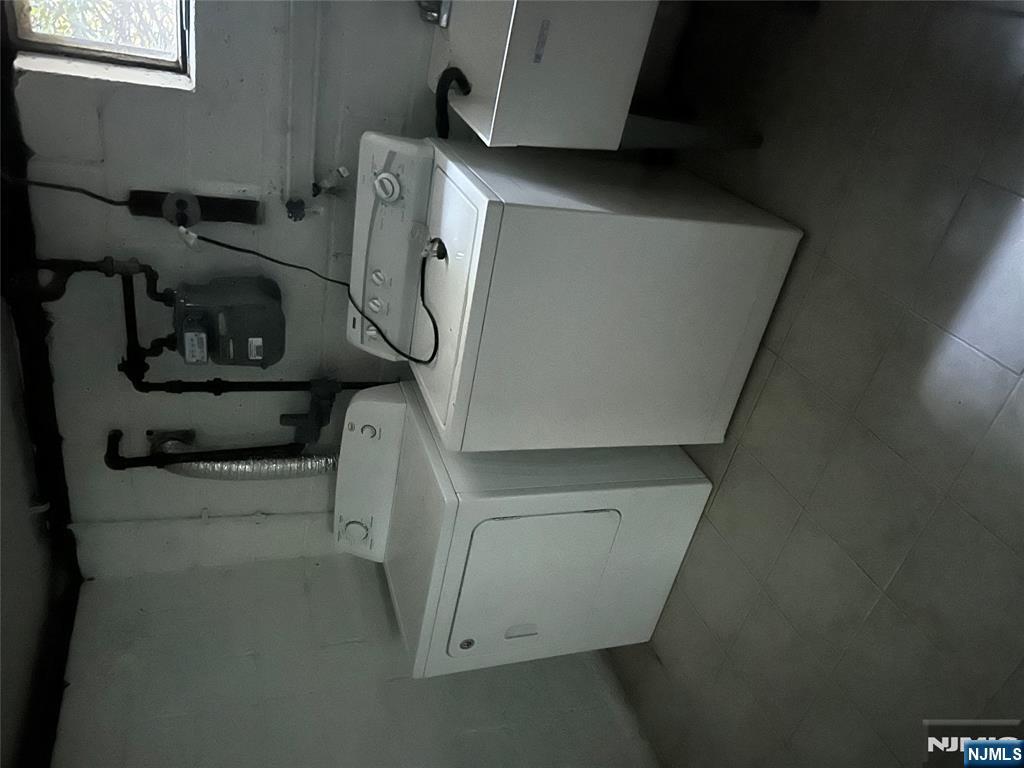 743 Newcomb Road Ridgewood, NJ 07450 - Photo 15 of 16 a utility room with dryer and washer