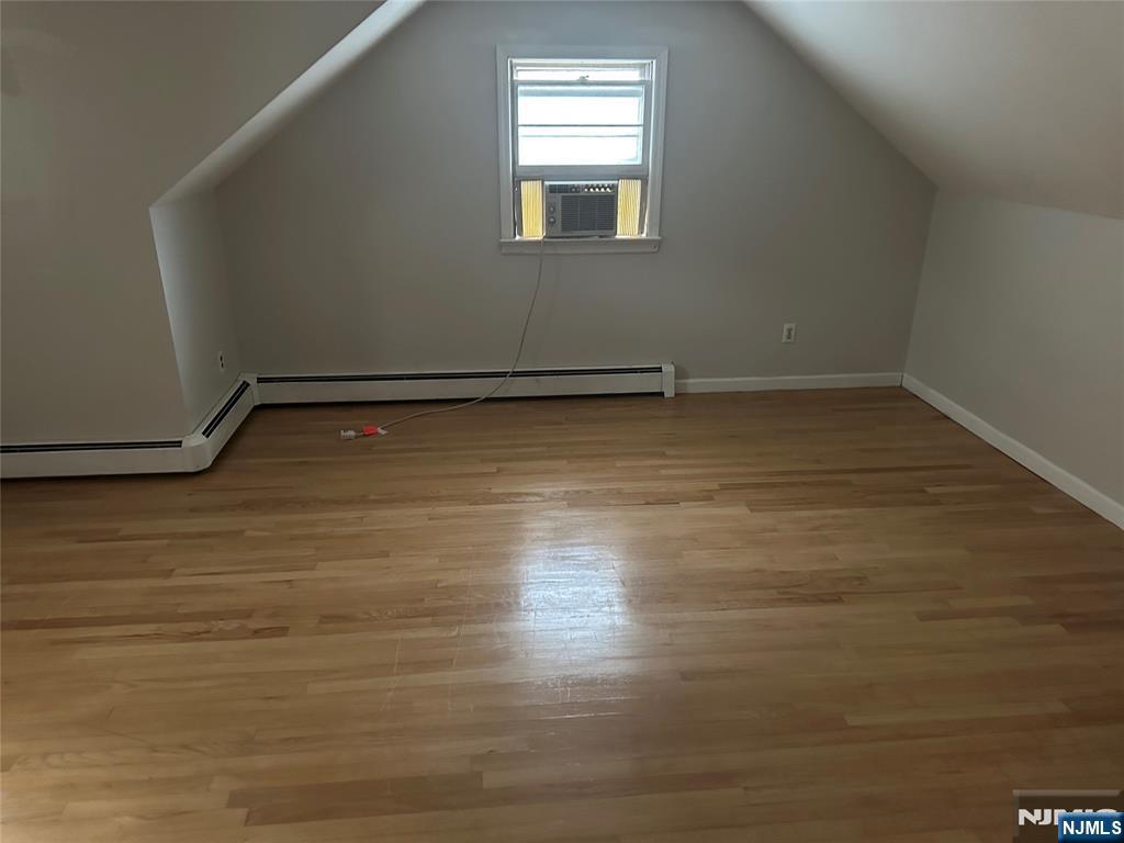 743 Newcomb Road Ridgewood, NJ 07450 - Photo 7 of 16 a view of a room with wooden floor and window
