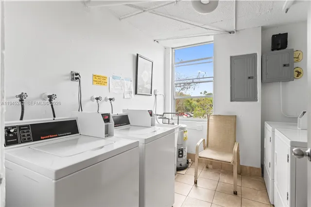 a view of a kitchen area with furniture and windows