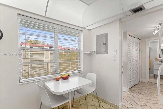 a kitchen with a sink and a window