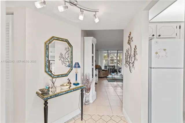 a view of hallway with furniture