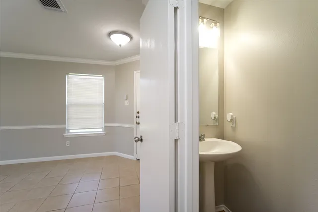 a bathroom with a sink shower