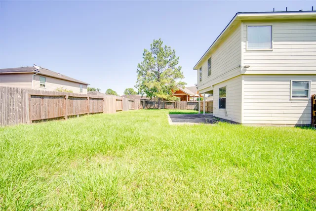 a house view with a outdoor space