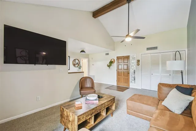 a kitchen with a refrigerator and a sink