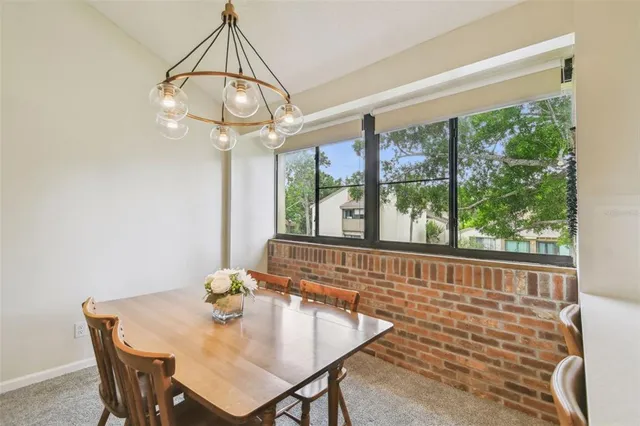 a kitchen with stainless steel appliances a stove sink and cabinets