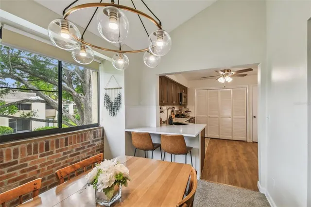 a view of a house with backyard and garden