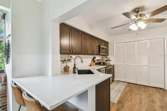 a view of a lake with a house