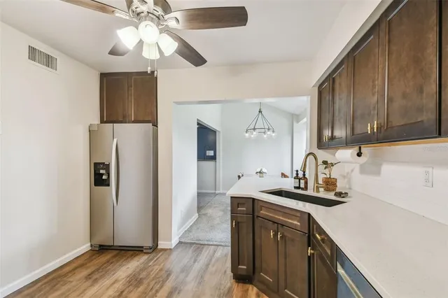 an aerial view of a house with a garden