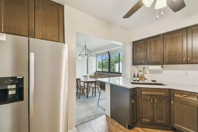 an aerial view of a house with a swimming pool