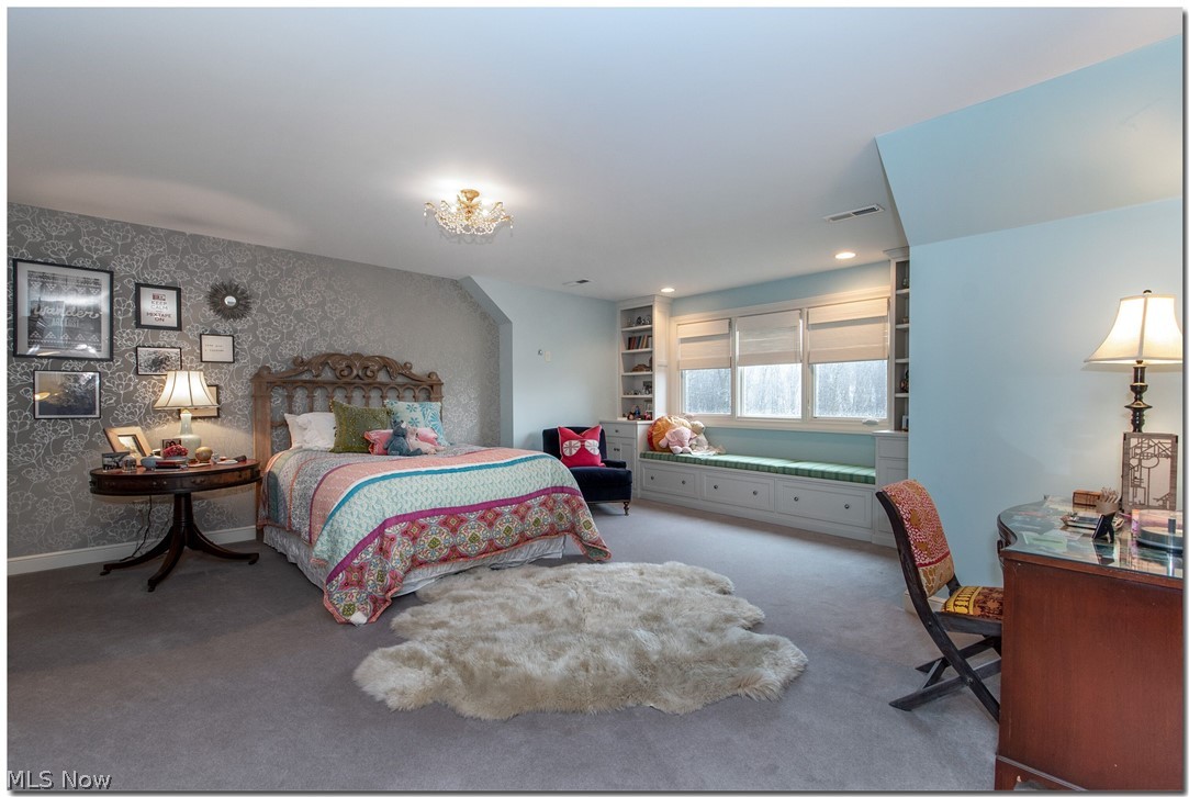 10 Pepper Ridge Road Cleveland, OH 44124 - Photo 23 of 34 This oversized bedroom enjoys a fanciful window seat, two large closets and in-suite full bath.