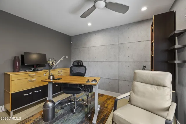 a room with a couch and a flat screen tv