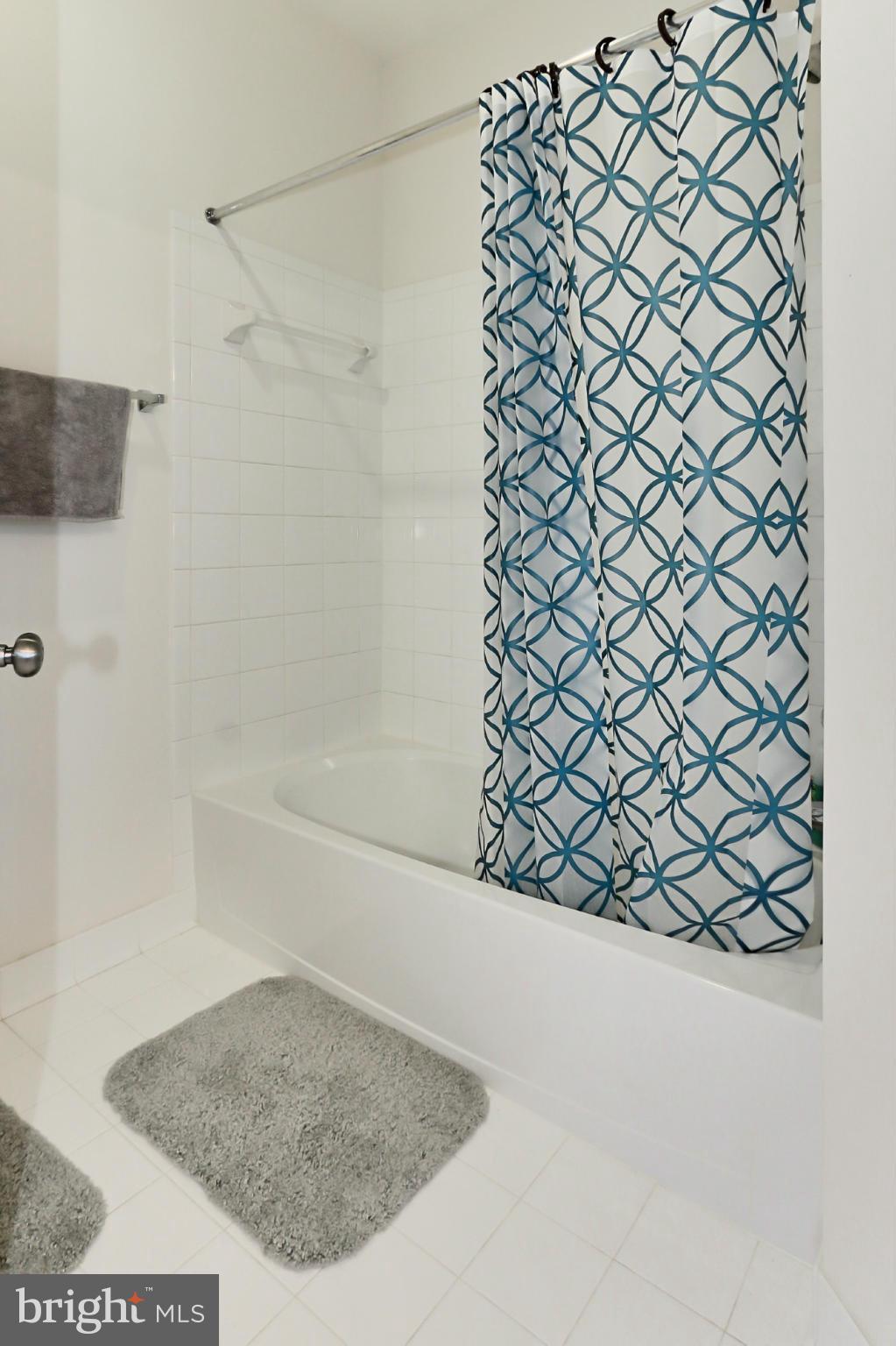 9419 Zebedee Street Manassas, VA 20110 - Photo 26 of 30 a bathroom with a shower