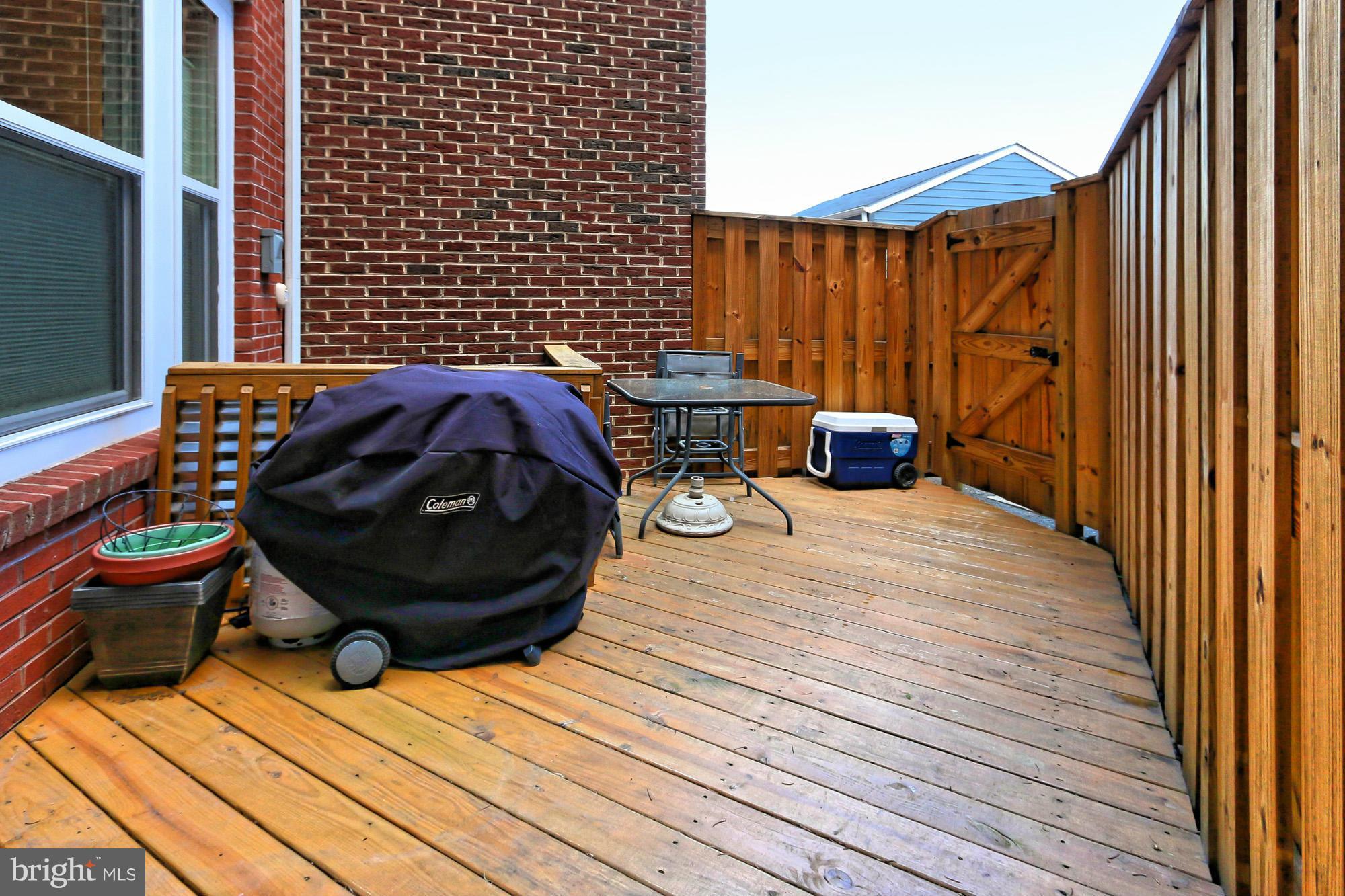 9419 Zebedee Street Manassas, VA 20110 - Photo 27 of 30 a view of a balcony with chairs
