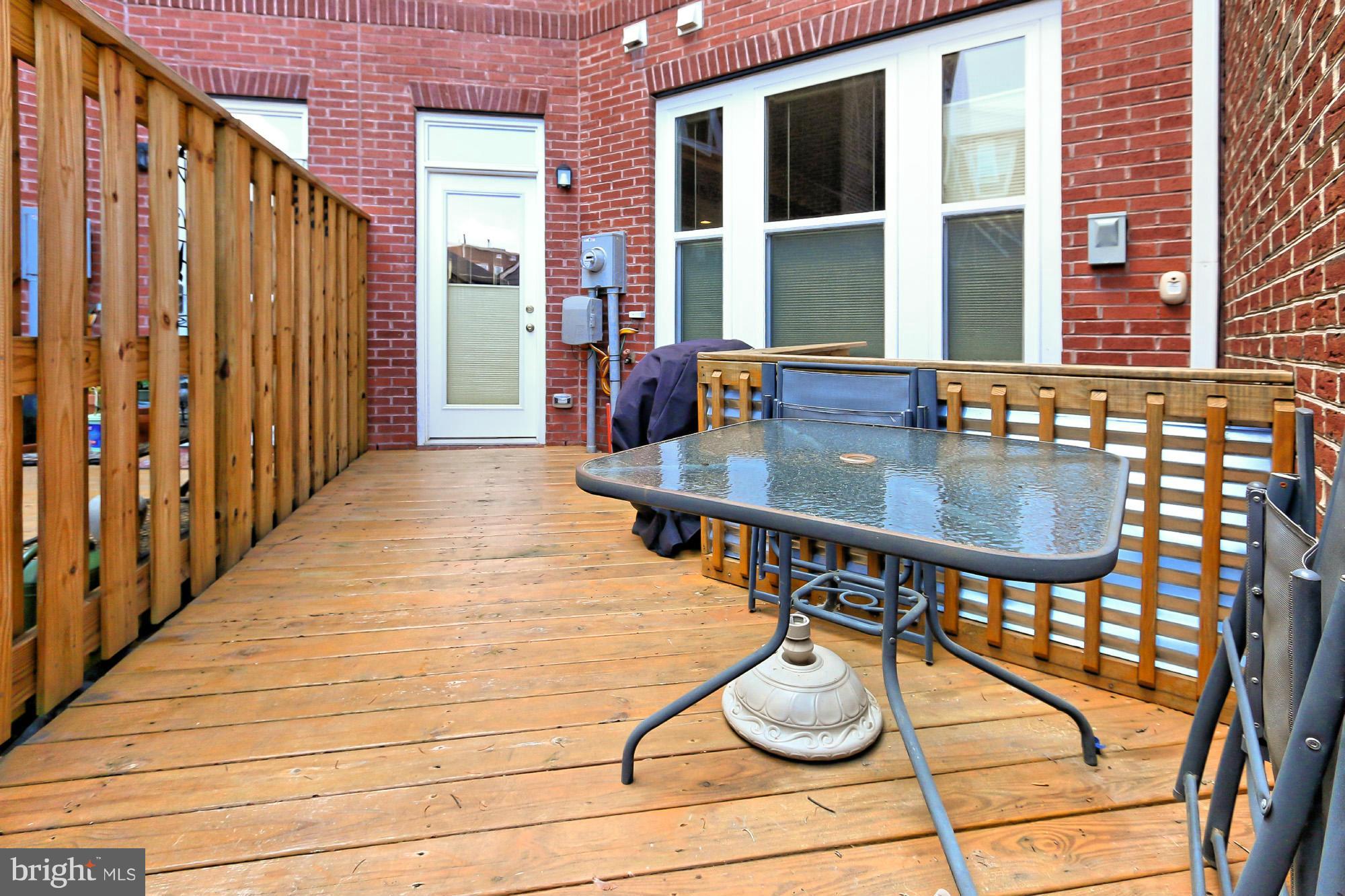 9419 Zebedee Street Manassas, VA 20110 - Photo 28 of 30 a dining room with table and chairs