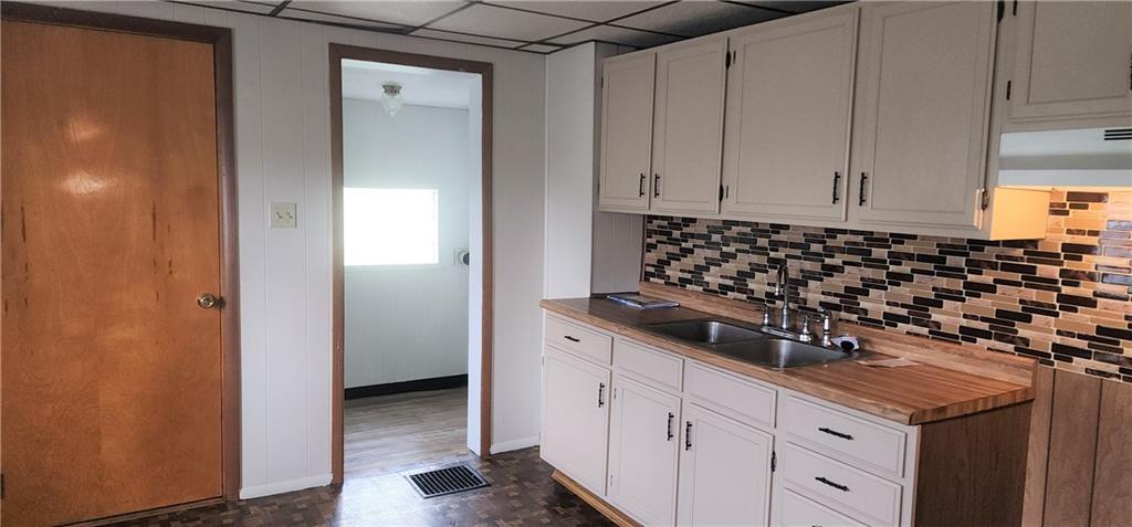 499 Filbert Orient Road Fairbank, PA 15435 - Photo 15 of 23 a kitchen with a sink and cabinets