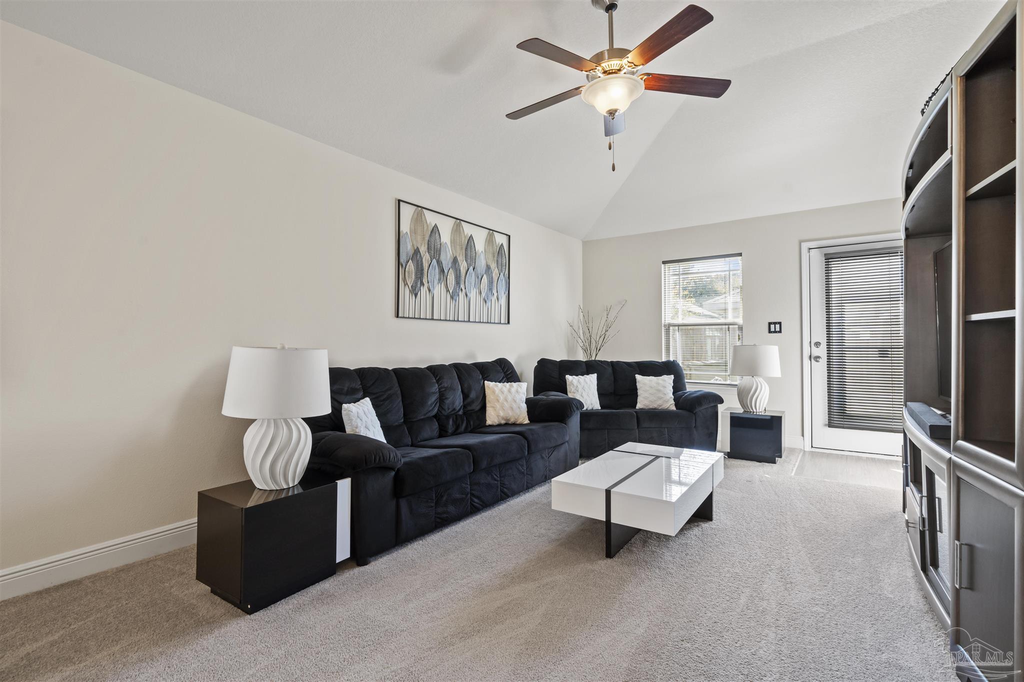 151 Cottage View Drive Pensacola, FL 32507 - Photo 8 of 17 a living room with furniture and a flat screen tv