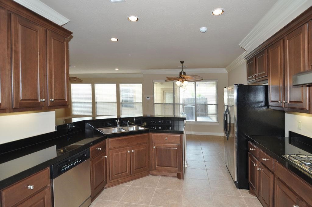 2055 Spring Cedar Lane Houston, TX 77077 - Photo 9 of 26 Great Kitchen layout with plenty of storage