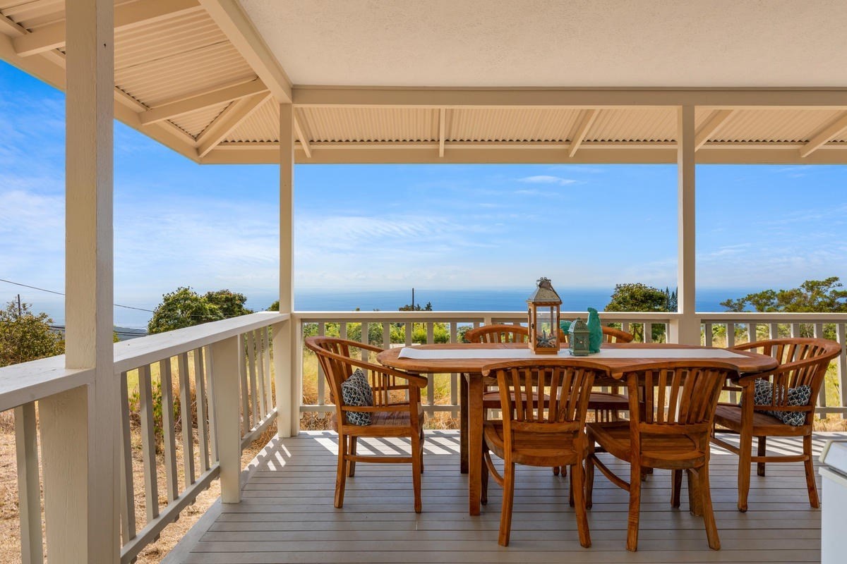 82-1019 KOA Road Captain Cook, HI 96704 - Photo 12 of 23 a view of a chairs and table in the balcony