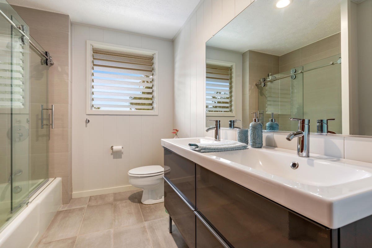 82-1019 KOA Road Captain Cook, HI 96704 - Photo 19 of 23 a bathroom with a sink toilet and shower