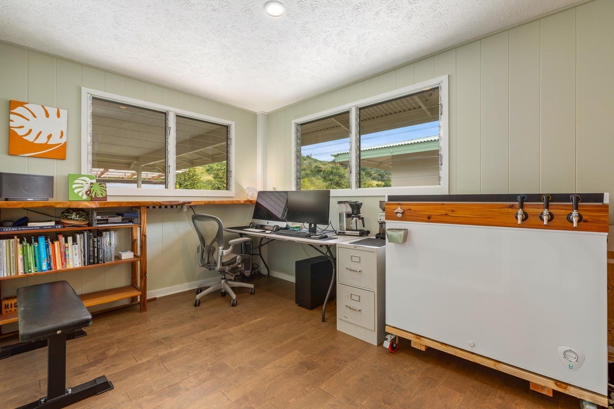 82-1019 KOA Road Captain Cook, HI 96704 - Photo 20 of 23 a view of a workspace with furniture and a window