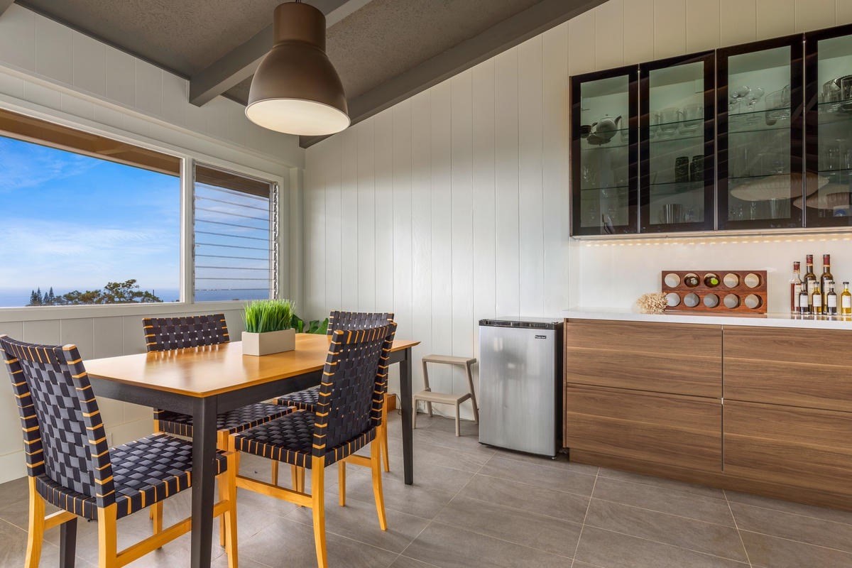 82-1019 KOA Road Captain Cook, HI 96704 - Photo 8 of 23 a view of a dining room with furniture and window