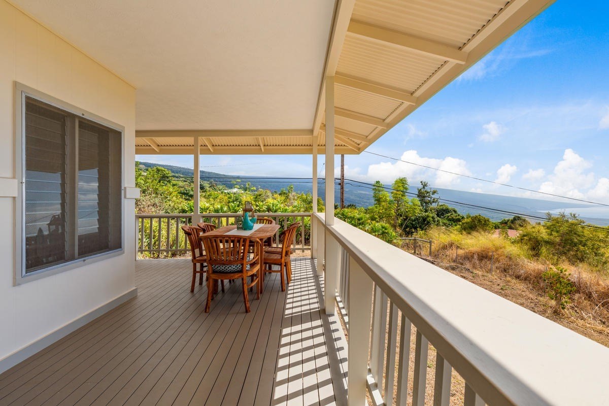 82-1019 KOA Road Captain Cook, HI 96704 - Photo 10 of 23 a view of a chairs and table in the balcony